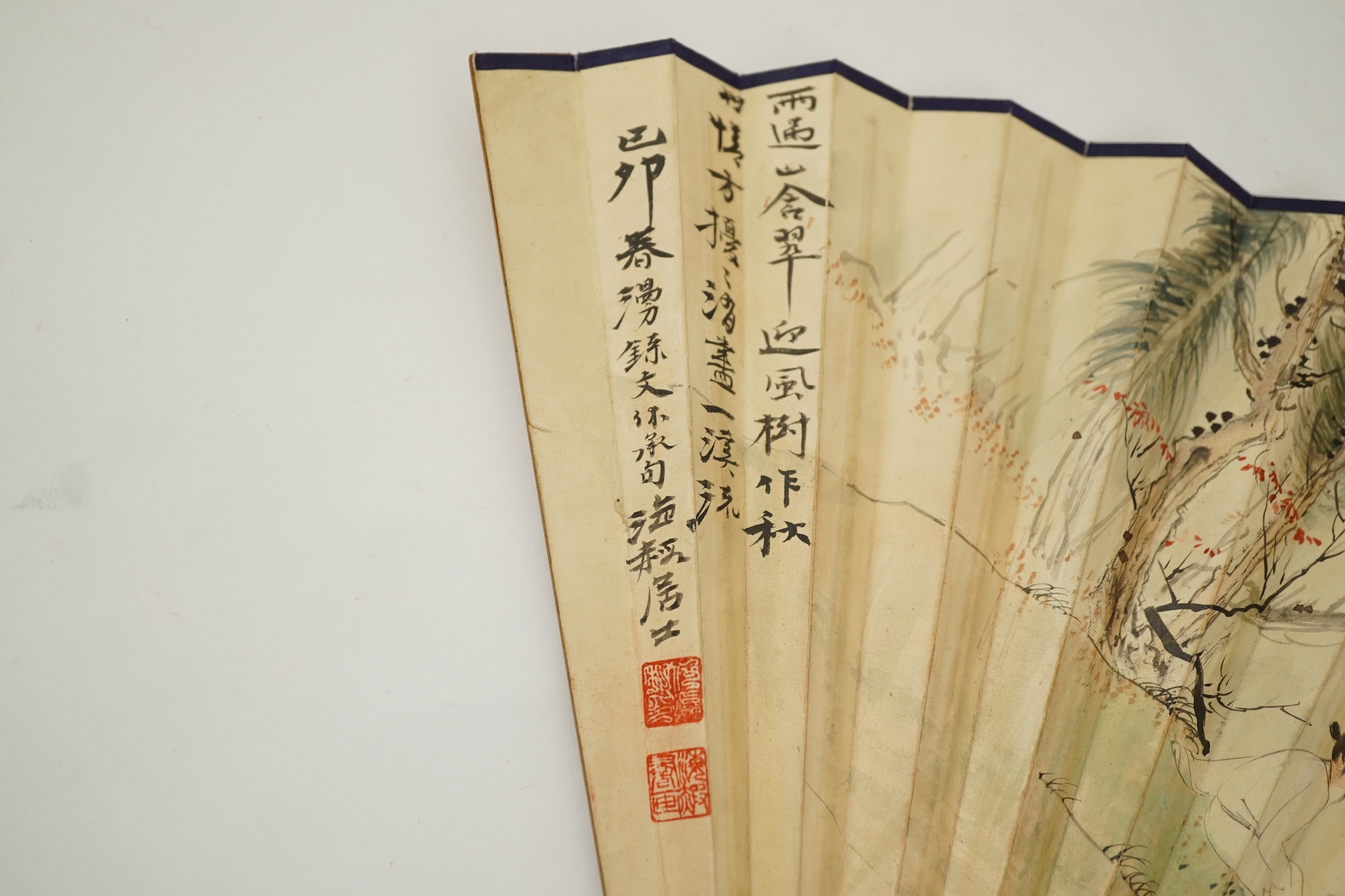 Two Chinese inscribed paper leaf fans, late 19th century